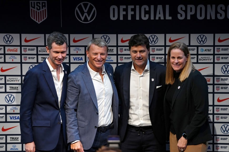 Sep 13, 2024; New York, New York, USA; United States men's national team head coach Mauricio Pochettino poses for a photo with chief executive officer and secretary general JT Batson, sporting director Matt Crocker, and president Cindy Parlow Cone after a press conference introducing him as the new head coach for the United States men's national team at Warner Bros. Discovery Hudson Center. Mandatory Credit: Lucas Boland-Imagn Images