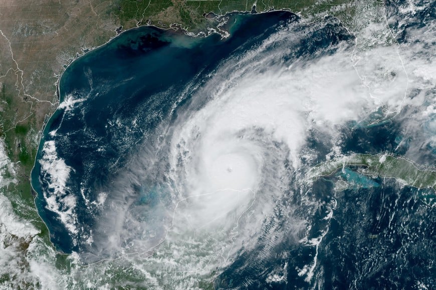 FILE PHOTO: A satellite image shows Hurricane Milton progressing before its expected landfall in Florida, in the Gulf of Mexico October 8, 2024.    CIRA/NOAA/Handout via REUTERS    THIS IMAGE HAS BEEN SUPPLIED BY A THIRD PARTY./File Photo