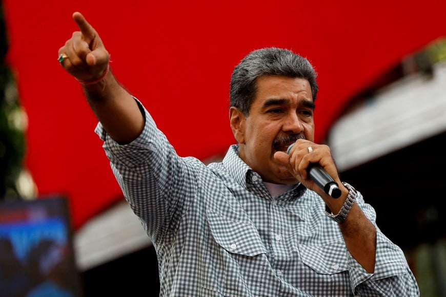 FILE PHOTO: Venezuelan President Nicolas Maduro delivers a speech during a rally to celebrate the results of last month's presidential election, in Caracas, Venezuela August 28, 2024. REUTERS/Fausto Torrealba/File Photo