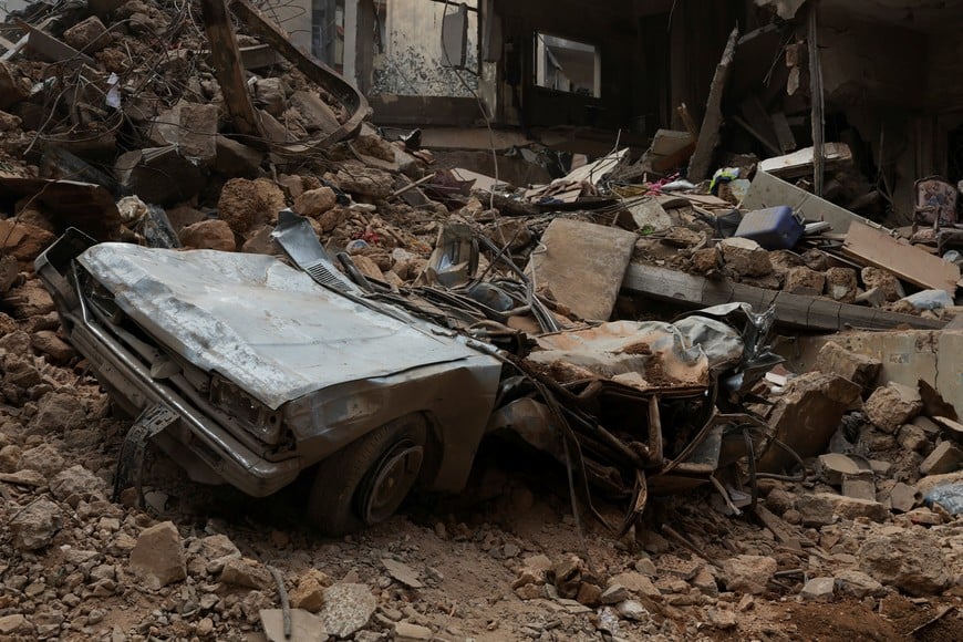 A view shows a damaged car and debris at a site of an Israeli strike, amid ongoing hostilities between Hezbollah and Israeli forces, in Beirut, Lebanon, October 12, 2024. REUTERS/Emilie Madi