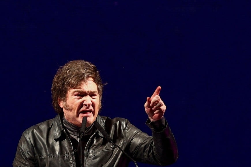 FILE PHOTO: Argentine President Javier Milei gestures as he delivers remarks onstage during a rally to launch his party, La Libertad Avanza, nationally, in Buenos Aires, Argentina September 28, 2024.  REUTERS/Matias Baglietto/File Photo