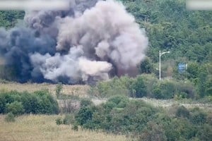 Smoke rises after North Korea blows up sections of inter-Korean roads on its side of the border between the two Koreas, according to South Korea's military, as seen from the South Korean side, October 15, 2024, in this screen grab from a handout video. South Korean Defence Ministry/Handout via REUTERS    THIS IMAGE HAS BEEN SUPPLIED BY A THIRD PARTY. STILL IMAGE TAKEN FROM VIDEO BLURRED AT SOURCE