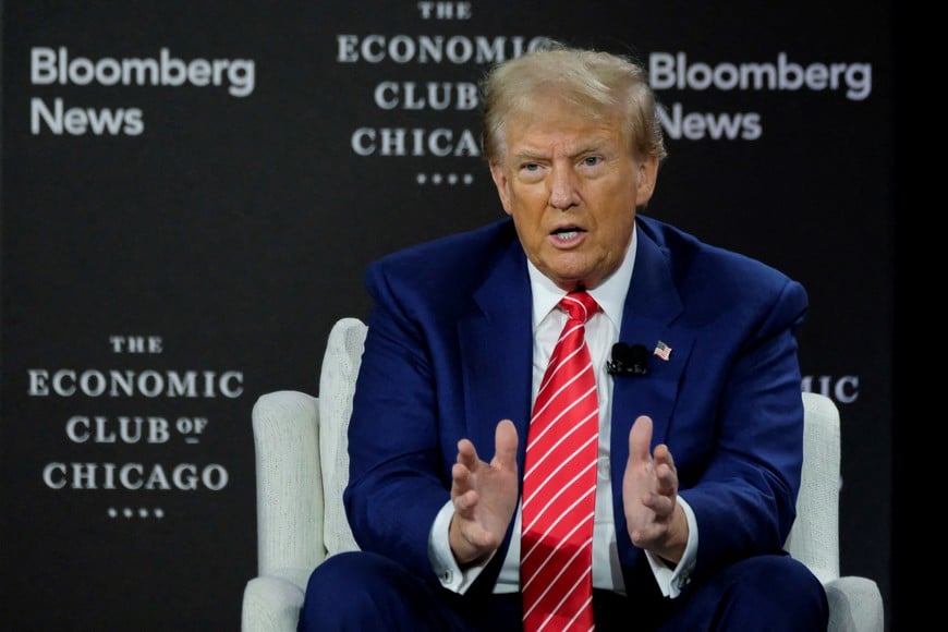 Republican presidential nominee and former U.S. President Donald Trump speaks as he is interviewed by Bloomberg Editor-in-Chief John Micklethwait at the Economic Club of Chicago in Chicago, Illinois, U.S. October 15, 2024.  REUTERS/Joel Angel Juarez