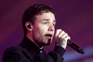 FILE PHOTO: British singer Liam Payne performs on stage during a concert in front of the Hotel de Ville to celebrate Paris as host for the 2024 Summer Olympic Games, Paris, France September 15, 2017. REUTERS/Charles Platiau/File Photo