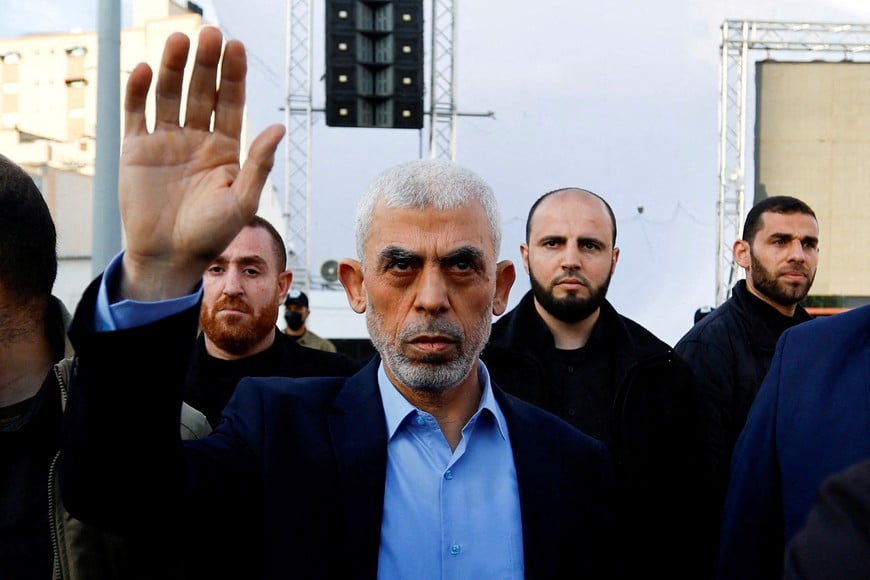 FILE PHOTO: Yahya Sinwar, Gaza Strip chief of the Palestinian Islamist Hamas movement, waves to Palestinians during a rally to mark the annual al-Quds Day (Jerusalem Day), in Gaza, April 14, 2023. REUTERS/Ibraheem Abu Mustafa/File Photo