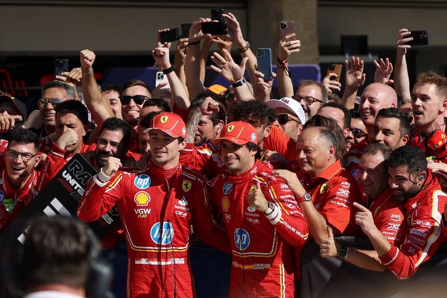 Formula One F1 - United States Grand Prix - Circuit of the Americas, Austin, Texas, United States - October 20, 2024
Ferrari's Charles Leclerc celebrates after winning the United States Grand Prix with second placed Ferrari's Carlos Sainz Jr. REUTERS/Kaylee Greenlee Beal