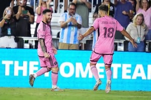 Oct 19, 2024; Fort Lauderdale, Florida, USA;  Inter Miami CF forward Lionel Messi (10) celebrates scoring withdefender Jordi Alba (18) during the second half against the New England Revolution at Chase Stadium. Mandatory Credit: Rich Storry-Imagn Images