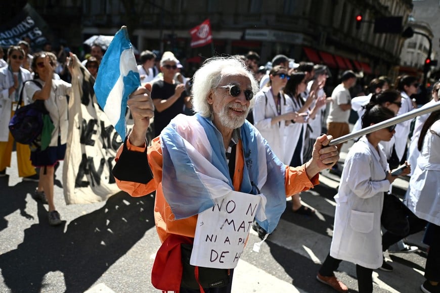 Medicine students and teachers take part in a protest against a bill vetoed by Argentina's President Javier Milei that would have updated public university funding in line with Argentina's triple-digit inflation rate, in Buenos Aires, Argentina, October 22, 2024. REUTERS/Pedro Lazaro Fernandez