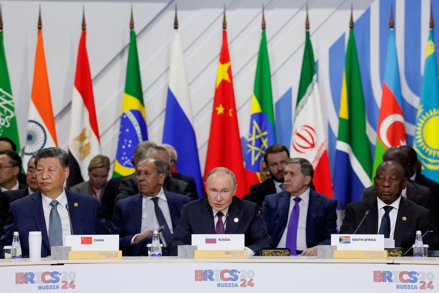 Officials, including South Africa's President Cyril Ramaphosa, Russia's President Vladimir Putin and China's President Xi Jinping, attend a plenary session in the outreach/BRICS Plus format at the BRICS summit in Kazan, Russia October 24, 2024. REUTERS/Maxim Shemetov/Pool