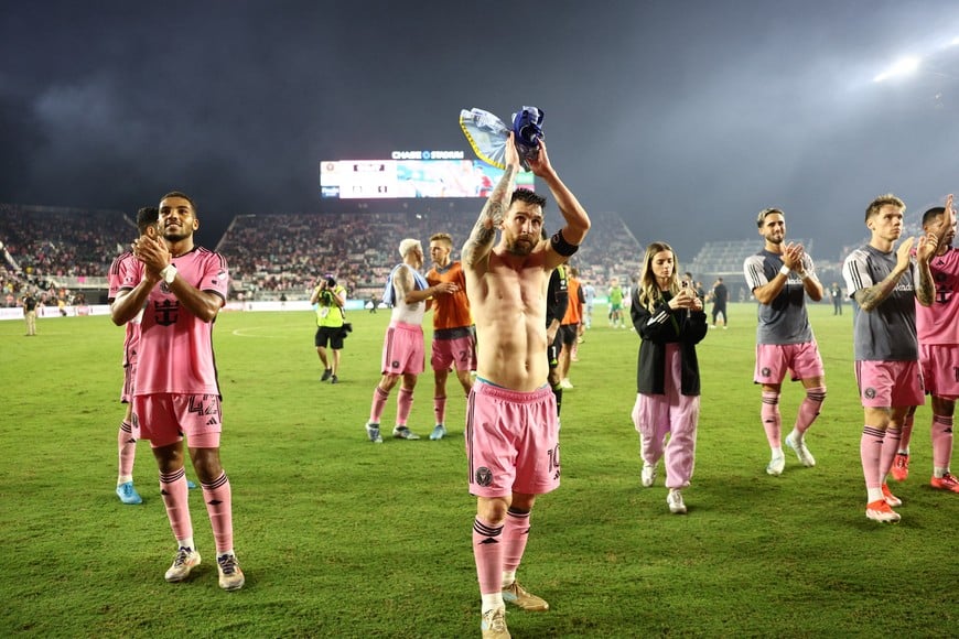 Oct 25, 2024; Fort Lauderdale, Florida, USA; Inter Miami CF forward Lionel Messi (10) and the Inter Miami CF clap for fans following a match against Atlanta United in a 2024 MLS Cup Playoffs Round One match  at Chase Stadium. Mandatory Credit: Nathan Ray Seebeck-Imagn Images