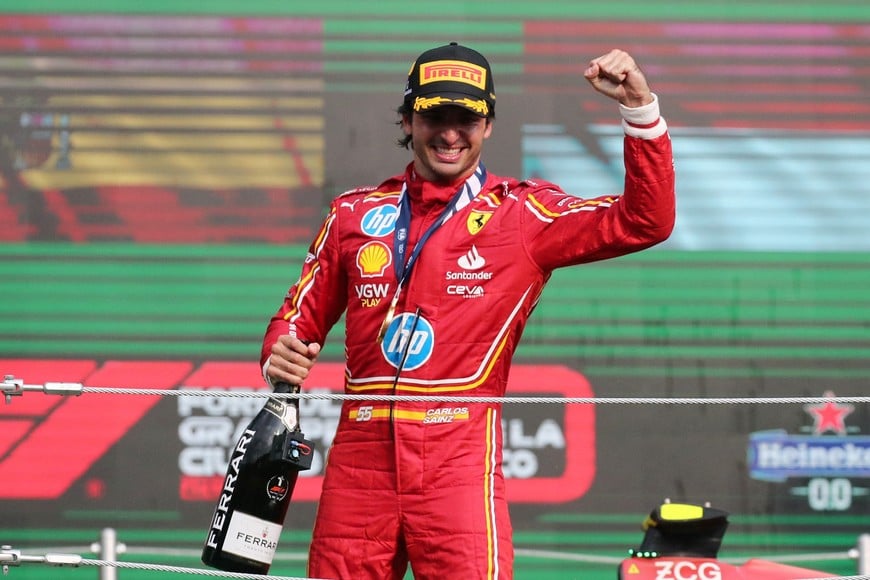 Formula One F1 - Mexico City Grand Prix - Autodromo Hermanos Rodriguez, Mexico City, Mexico - October 27, 2024
Ferrari's Carlos Sainz Jr. celebrates on the podium after winning the Mexico City Grand Prix REUTERS/Henry Romero