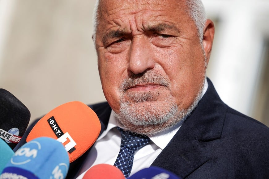 Boyko Borissov, former Bulgarian prime minister and leader of the centre-right GERB party, speaks to members of the media after casting his vote at a polling station during the snap parliamentary election, in Sofia, Bulgaria, October 27, 2024.  REUTERS/Stoyan Nenov