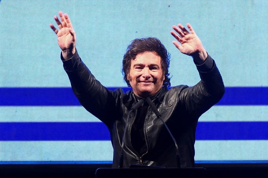 FILE PHOTO: Argentine President Javier Milei gestures onstage during a rally to launch his party, La Libertad Avanza, nationally, in Buenos Aires, Argentina September 28, 2024. REUTERS/Matias Baglietto/File Photo