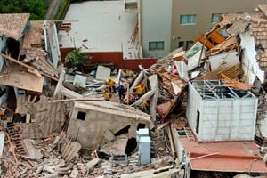 A drone view shows rescue workers searching for victims amidst the remains of the hotel Dubrovnik, after it collapsed, in the coastal city of Villa Gesell, Buenos Aires, Argentina October 29, 2024. REUTERS/Pablo Funes