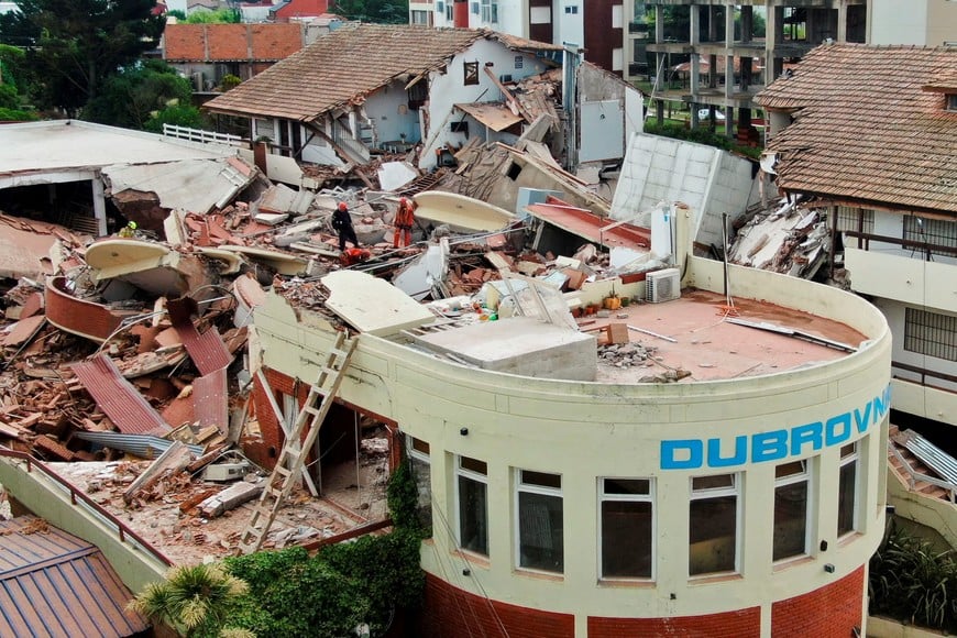 A drone view shows rescue workers searching for victims amidst the remains of the hotel Dubrovnik, after it collapsed, in the coastal city of Villa Gesell, Buenos Aires, Argentina October 29, 2024. REUTERS/Pablo Funes