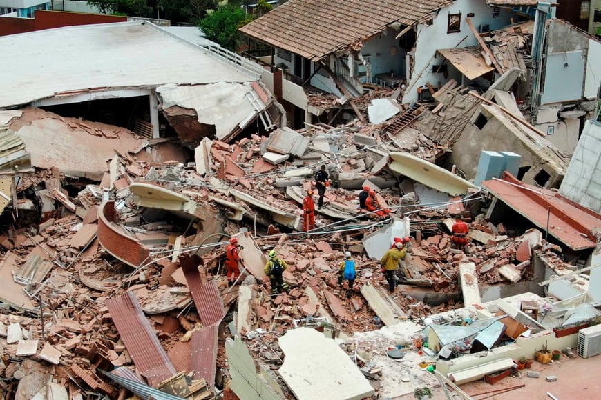 A drone view shows rescue workers searching for victims amidst the remains of the hotel Dubrovnik, after it collapsed, in the coastal city of Villa Gesell, Buenos Aires, Argentina October 29, 2024. REUTERS/Pablo Funes