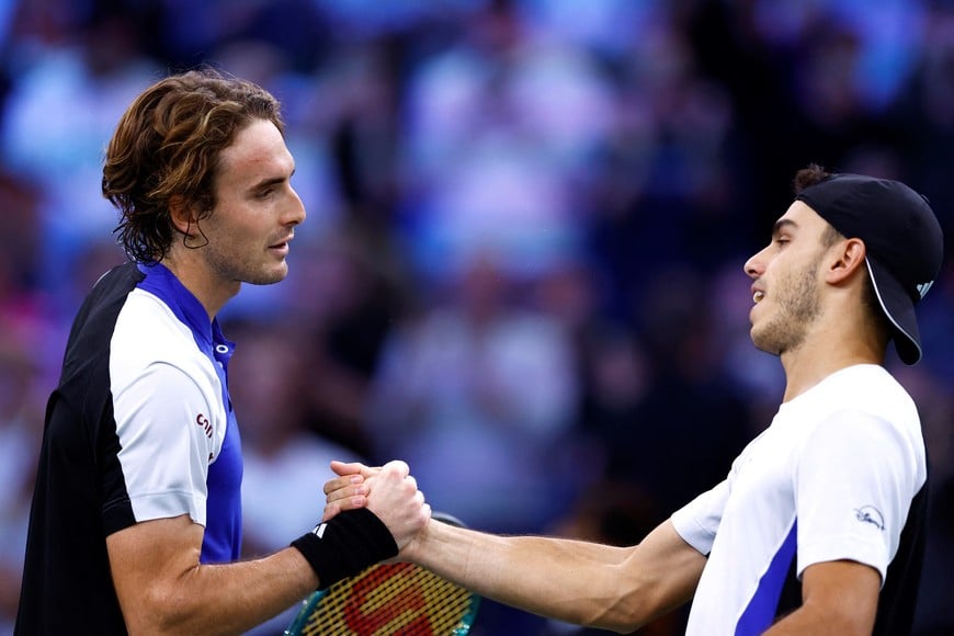 Tennis - Paris Masters - Accor Arena, Paris, France - October 31, 2024
Greece's Stefanos Tsitsipas with Argentina's Francisco Cerundolo after their round of 16 match REUTERS/Stephanie Lecocq