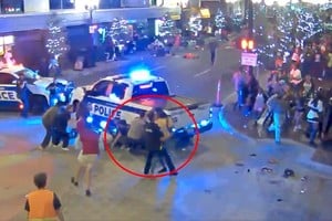 A police officer tries to detain a man after a shooting incident in Orlando, Florida, U.S., November 1, 2024, in this screengrab obtained from a video. @OrlandoPolice via X/Handout via REUTERS    THIS IMAGE HAS BEEN SUPPLIED BY A THIRD PARTY. NO RESALES. NO ARCHIVES. MANDATORY CREDIT. OVERLAY ON IMAGE ADDED AT SOURCE