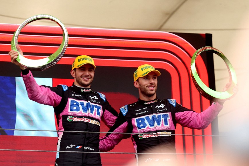 Formula One F1 - Sao Paulo Grand Prix - Autodromo Jose Carlos Pace, Sao Paulo, Brazil - November 3, 2024
Second place Alpine's Esteban Ocon and third place Alpine's Pierre Gasly celebrate on the podium with trophies after the Sao Paulo Grand Prix REUTERS/Carla Carniel