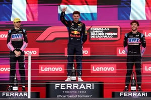 Formula One F1 - Sao Paulo Grand Prix - Autodromo Jose Carlos Pace, Sao Paulo, Brazil - November 3, 2024
Red Bull's Max Verstappen celebrates on the podium after winning the Sao Paulo Grand Prix alongside second place Alpine's Esteban Ocon and third place Alpine's Pierre Gasly REUTERS/Amanda Perobelli