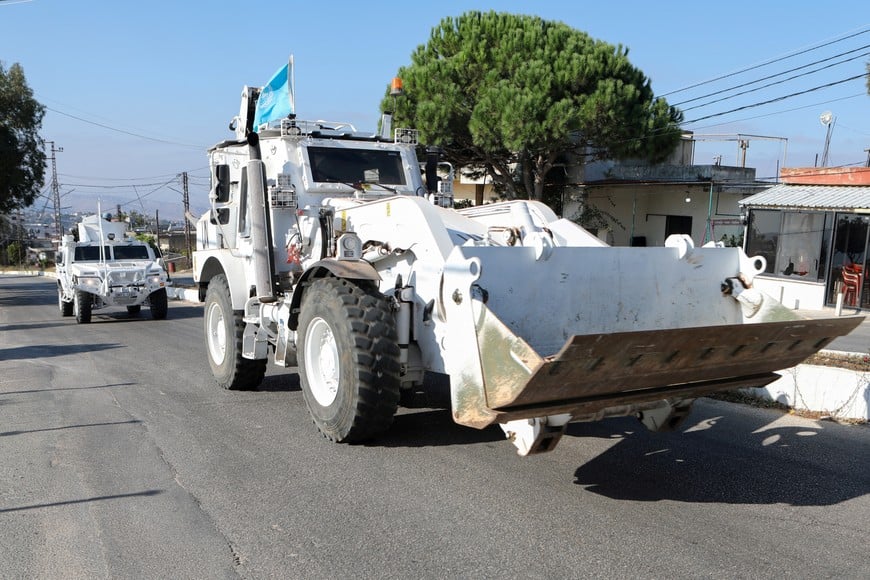 UN peacekeepers (UNIFIL) vehicles drive in Marjayoun, near the border with Israel, amid ongoing hostilities between Hezbollah and Israeli forces, southern Lebanon October 11, 2024. REUTERS/Karamallah Daher