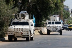 FILE PHOTO: UN peacekeepers (UNIFIL) vehicles are seen parked in Marjayoun, near the border with Israel, in southern Lebanon August 9, 2024. REUTERS/Karamallah Daher/File Photo