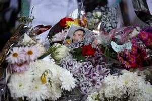 Tributes are left outside the hotel where Liam Payne, former One Direction band member, was found dead after he fell from a third-floor hotel room balcony, in Buenos Aires, Argentina, October 18, 2024. REUTERS/Agustin Marcarian