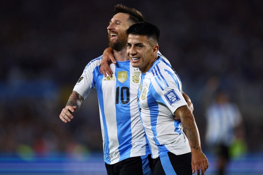 Soccer Football - World Cup - South American Qualifiers - Argentina v Bolivia - Estadio Mas Monumental, Buenos Aires, Argentina - October 15, 2024
Argentina's Lionel Messi celebrates scoring their fifth goal with Thiago Almada REUTERS/Agustin Marcarian