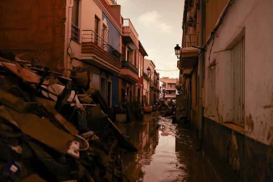 A view shows a destroyed street, in the aftermath of heavy rains that caused floods, in Paiporta, near Valencia, Spain, November 4, 2024. REUTERS/Nacho Doce