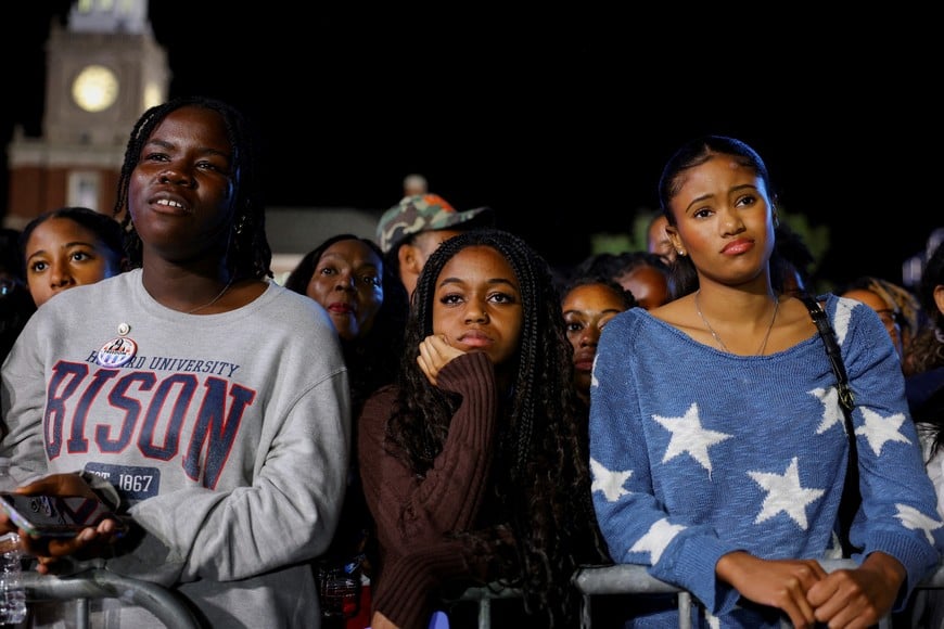 Attendees look disappointed as they watch early election results at Democratic presidential nominee U.S. Vice President Kamala Harris' election night rally during the 2024 U.S. presidential election, at Howard University, in Washington, U.S., November 5, 2024 REUTERS/Kevin Mohatt