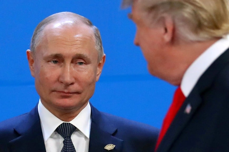 FILE PHOTO: Russia's President Vladimir Putin and U.S. President Donald Trump are seen during the G20 summit in Buenos Aires, Argentina November 30, 2018. REUTERS/Marcos Brindicci/File Photo/File Photo