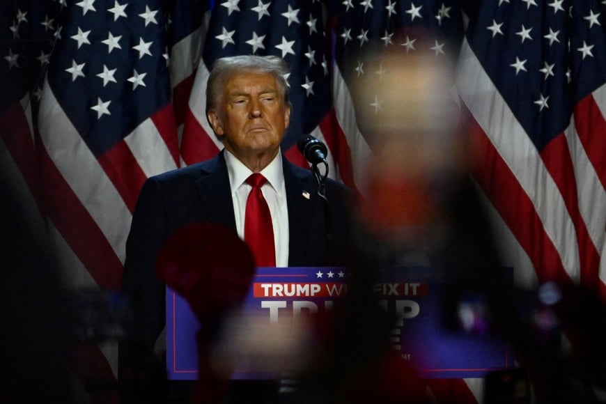 Republican presidential nominee and former U.S. President Donald Trump takes the stage following early results from the 2024 U.S. presidential election in Palm Beach County Convention Center, in West Palm Beach, Florida, U.S., November 6, 2024. REUTERS/Callaghan O'Hare