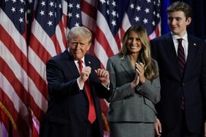 FILE PHOTO: Republican presidential nominee and former U.S. President Donald Trump dances accompanied by Melania Trump and Barron Trump, after speaking following early results from the 2024 U.S. presidential election in Palm Beach County Convention Center, in West Palm Beach, Florida, U.S., November 6, 2024. REUTERS/Carlos Barria/File Photo     TPX IMAGES OF THE DAY.     SEARCH "U.S. ELECTION PICTURES" FOR THIS STORY. SEARCH "WIDER IMAGE" FOR ALL STORIES.