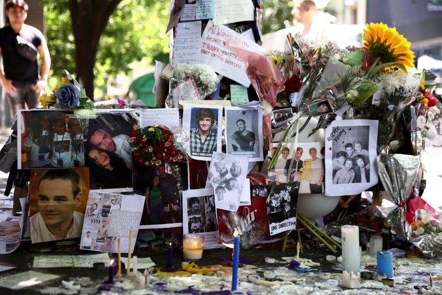 Tributes are left outside the hotel where Liam Payne, former One Direction band member, was found dead after he fell from a third-floor hotel room balcony, in Buenos Aires, Argentina October 18, 2024. REUTERS/Tomas Cuesta