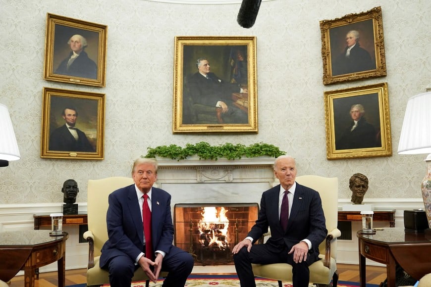 U.S. President Joe Biden meets with President-elect Donald Trump in the Oval Office at the White House in Washington, U.S., November 13, 2024. REUTERS/Kevin Lamarque