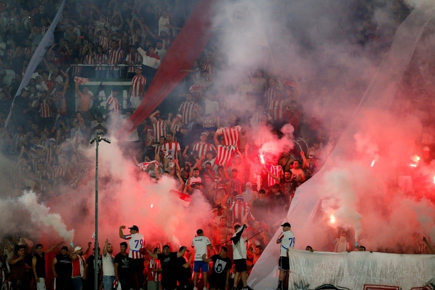 Soccer Football - World Cup - South American Qualifiers - Paraguay v Argentina - Estadio Defensores del Chaco, Asuncion, Paraguay - November 14, 2024
Paraguay fans with flares after winning the match REUTERS/Cesar Olmedo