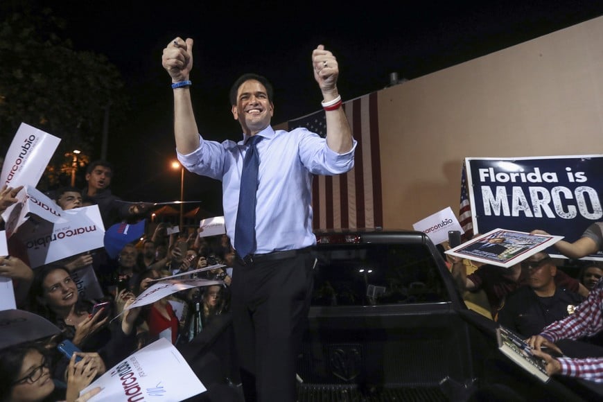 FILE PHOTO: U.S. Senator and Republican presidential candidate Marco Rubio stands in the back of pick up truck as he speaks at a campaign rally in Miami, Florida, March 14, 2016. REUTERS/Carlo Allegri /File Photo