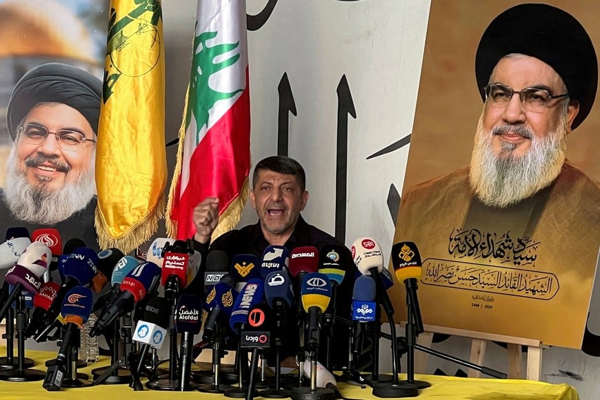 FILE PHOTO: The head of Hezbollah's media office, Mohammad Afif, speaks during a press conference in Beirut's southern suburbs in Lebanon, amid the ongoing hostilities between Hezbollah and Israeli forces, November 11, 2024. REUTERS/Haider Kadhim/File Photo