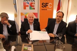 Miguel Lifschitz junto a José Corral.