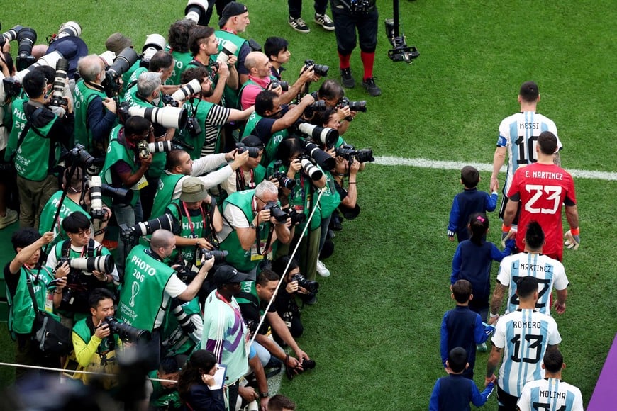 Soccer Football - FIFA World Cup Qatar 2022 - Group C - Argentina v Saudi Arabia - Lusail Stadium, Lusail, Qatar - November 22, 2022 
Argentina's Lionel Messi leads teammates onto the pitch before the match REUTERS/Marko Djurica     TPX IMAGES OF THE DAY