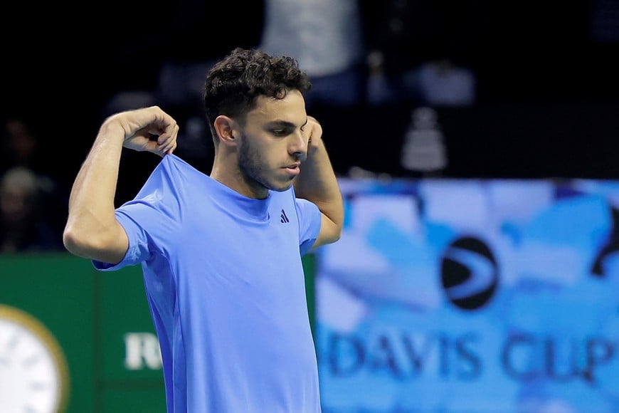 Tennis - Davis Cup Finals - Quarter Final - Italy v Argentina - Palacio de Deportes Jose Maria Martin Carpena Arena, Malaga, Spain - November 21, 2024
Argentina's Francisco Cerundolo celebrates winning his match against Italy's Lorenzo Musetti REUTERS/Jon Nazca