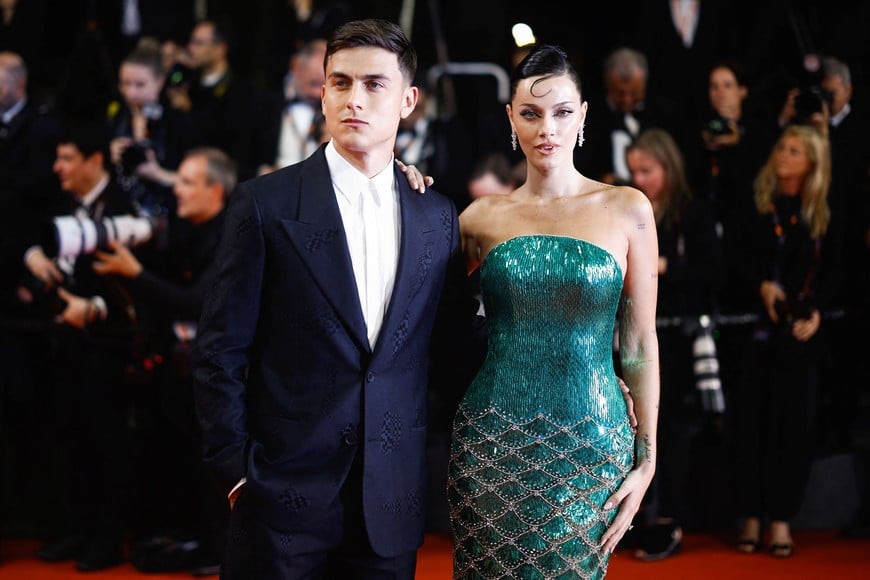 Oriana Sabatini and Paulo Dybala pose on the red carpet during arrivals for the screening of the film "The Shrouds" (Les linceuls) in competition at the 77th Cannes Film Festival in Cannes, France, May 20, 2024. REUTERS/Stephane Mahe