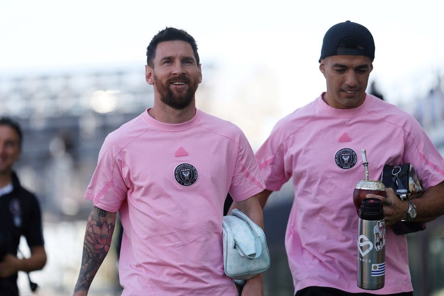 Apr 20, 2024; Fort Lauderdale, Florida, USA; Inter Miami CF forward Lionel Messi (10) and forward Luis Suarez (9) arrive before the game against Nashville SC at Chase Stadium. Mandatory Credit: Nathan Ray Seebeck-USA TODAY Sports