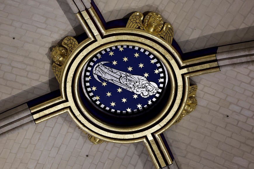 A view of the base under the arrow during a visit of France's President at Notre-Dame de Paris cathedral in Paris, on November 29, 2024. The Notre-Dame Cathedral is set to re-open early December 2024, with a planned weekend of ceremonies on December 7 and 8, 2024, five years after the 2019 fire which ravaged the world heritage landmark and toppled its spire. Some 250 companies and hundreds of experts were mobilised for the five-year restoration costing hundreds of millions of euros.     STEPHANE DE SAKUTIN/Pool via REUTERS