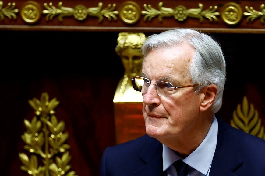 French Prime Minister Michel Barnier speaks to announce the use by the French government of article 49.3, a special clause in the French Constitution, to push the budget bill through the National Assembly without a vote by lawmakers, during a debate on the 2025 Social Security Financing bill (PLFSS) at the National Assembly in Paris, France, December 2, 2024. REUTERS/Sarah Meyssonnier