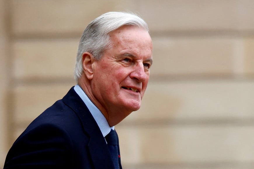 FILE PHOTO: French Prime Minister Michel Barnier leaves following the weekly cabinet meeting at the Elysee Palace in Paris, France, November 27, 2024. REUTERS/Stephane Mahe/File Photo