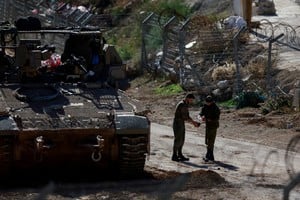 Israeli soldiers gather near the ceasefire line between Syria and the Israeli-occupied Golan Heights, December 9, 2024. REUTERS/Ammar Awad     TPX IMAGES OF THE DAY