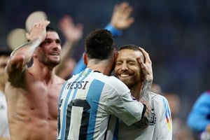 Soccer Football - FIFA World Cup Qatar 2022 - Round of 16 - Argentina v Australia - Ahmad bin Ali Stadium, Al Rayyan, Qatar - December 3, 2022
Argentina's Lionel Messi and Alejandro Gomez celebrate after the match as Argentina progress to the quarter finals REUTERS/Kai Pfaffenbach