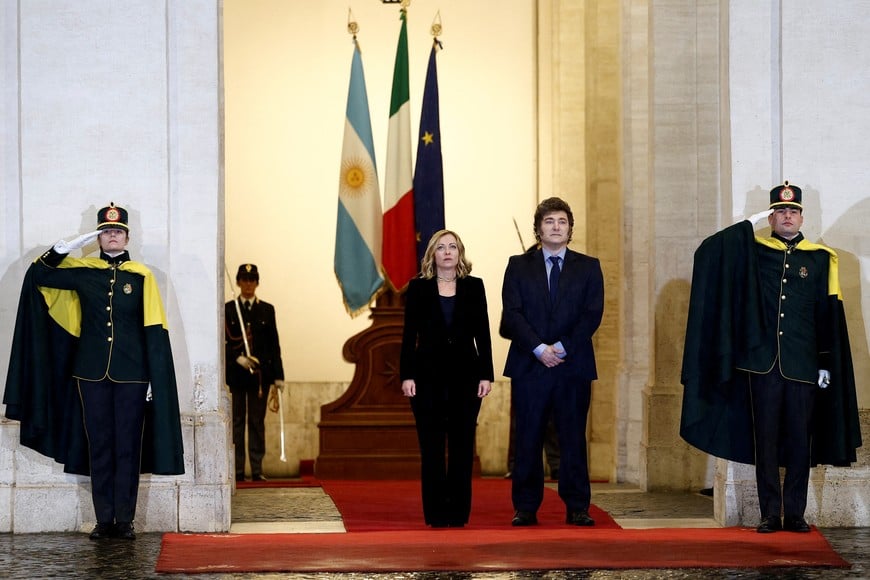 Italian Prime Minister Giorgia Meloni and Argentina's President Javier Milei meet at Chigi Palace, in Rome, Italy, December 13, 2024. REUTERS/Guglielmo Mangiapane