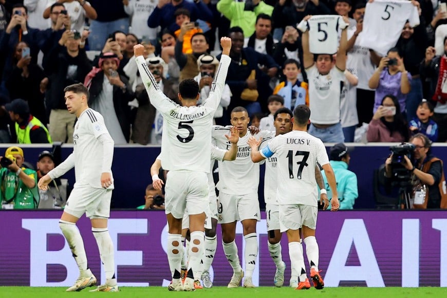 Soccer Football - Intercontinental Cup - Final - Real Madrid v Pachuca - Lusail Stadium, Lusail, Qatar - December 18, 2024
Real Madrid's Kylian Mbappe celebrates scoring their first goal with teammates REUTERS/Ibraheem Al Omari